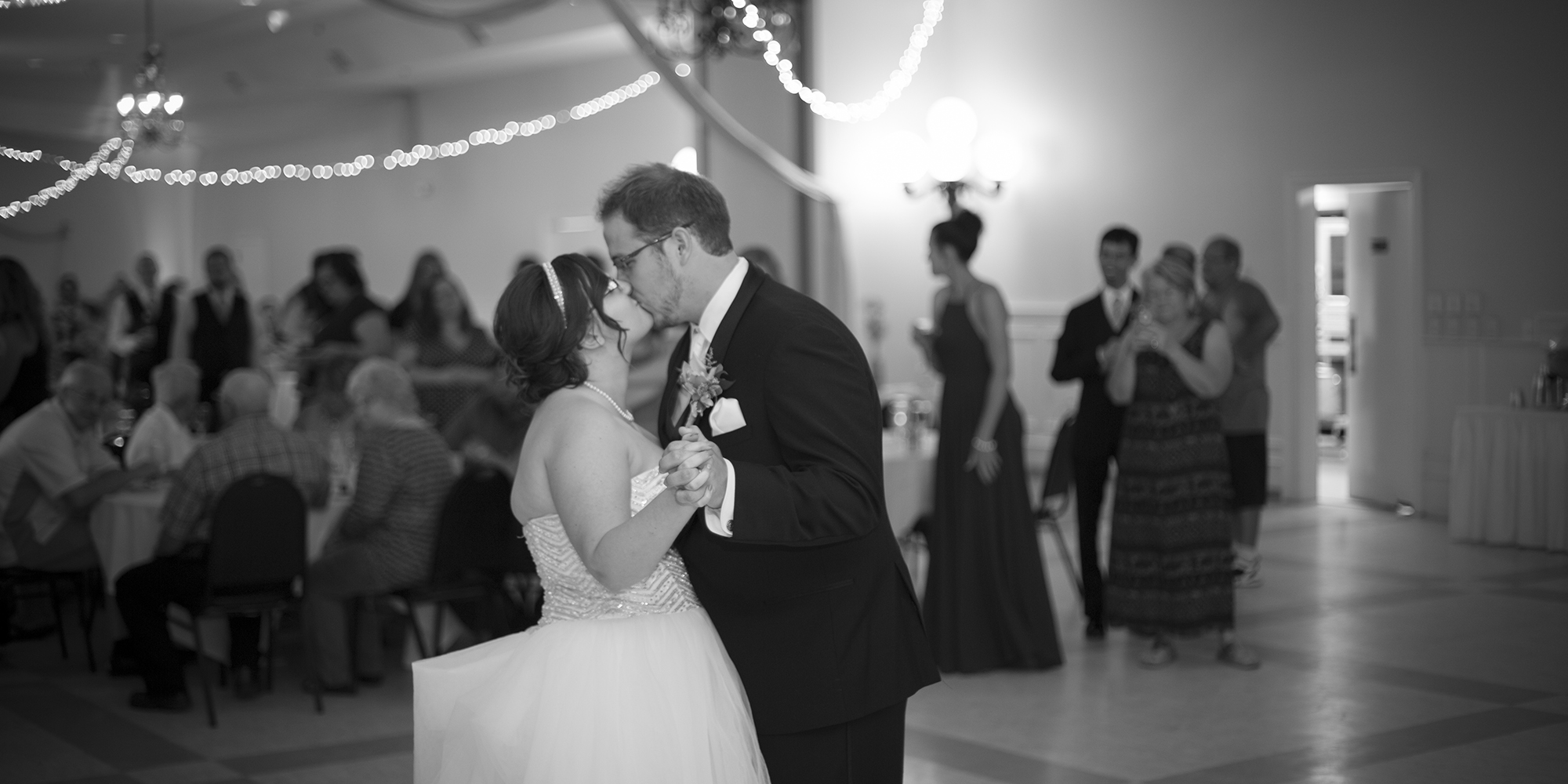 bride and groom first dance kiss